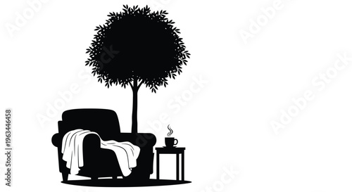 Cozy armchair side table and tree in a striking black silhouette