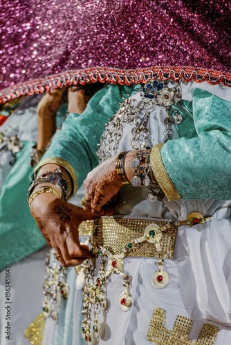 The jewelry of an Amazigh woman, while performing the Ahwach dance, in southern Morocco.