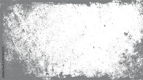 Grungy distressed grey and white textured background with scattered speckles and scratches grunge