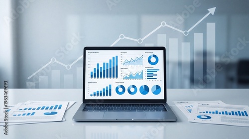 A laptop screen displaying professional business data analytics charts and financial growth graphs