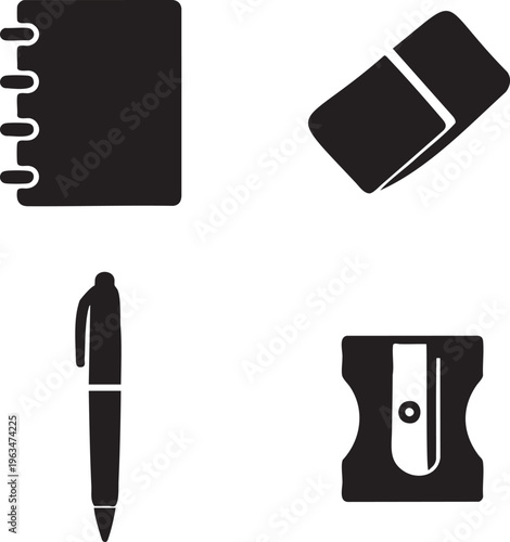 Black of notebook pen eraser and pencil sharpener on white