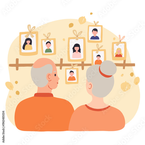 Elderly couple looking at family photos displayed on a wall. Elderly set