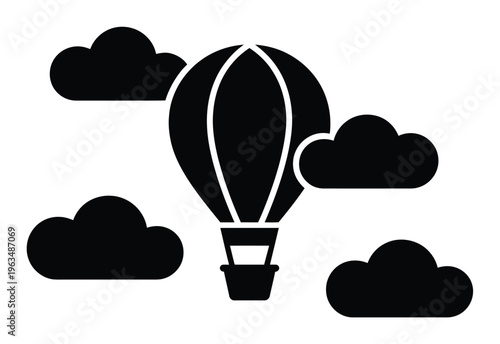 Black and white silhouette of a hot air balloon floating among clouds