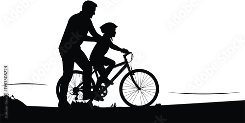 Black silhouette of a father teaching his young son how to ride a bicycle in nature during a beautiful sunset.