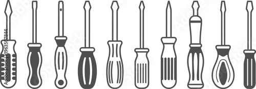 Various types of screwdrivers with different handle and colors in a line-up handles tools flathead