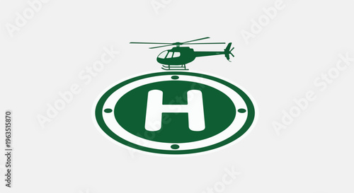 Green helicopter symbol on helipad sign with letter H