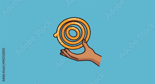 Hand holding a spiral-shaped sweet treat against a blue background