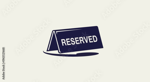 Simple navy blue tent sign displaying the word "RESERVED