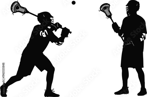 Lacrosse players in silhouette during a game with sticks and ball ready to play.