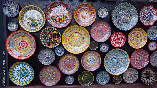 vibrant collection of traditional Uzbek ceramic plates - Beshqozon