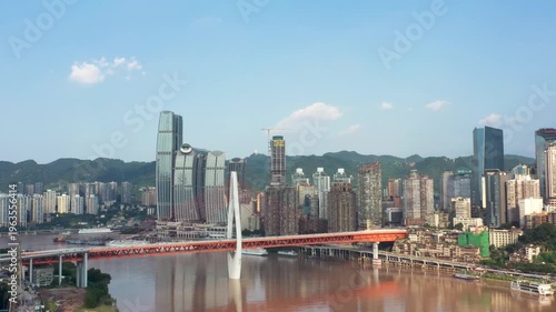 Chongqing Yuzhong District skyline with red bridge over the Yangtze River
