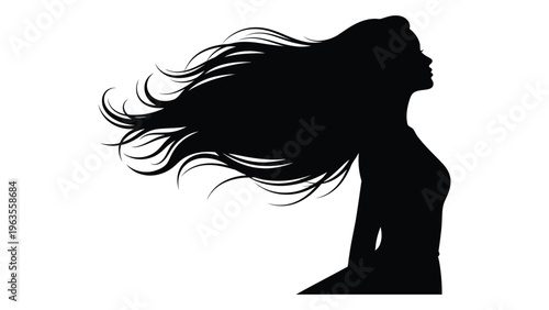 Silhouette of a woman with flowing hair in the wind