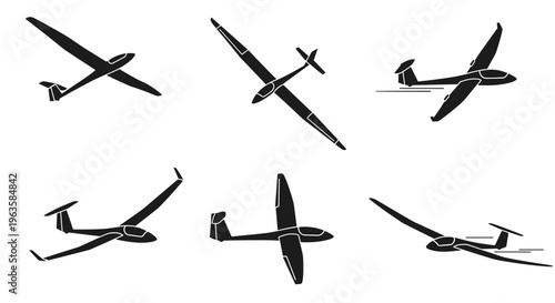 Collection of six black glider silhouettes in various flight positions against a white background