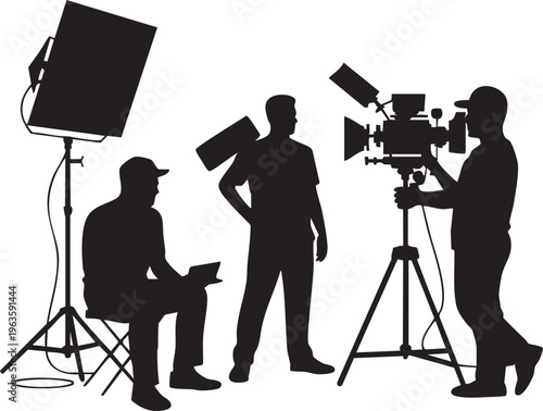 Film crew at work in black silhouette with professional lighting equipment for cinematic production
