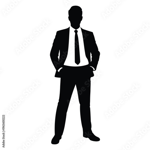 A sharply dressed man in a suit and tie stands confidently a striking silhouette