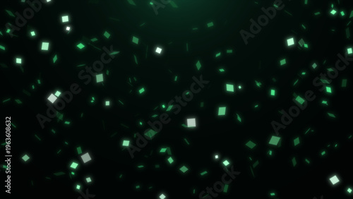Numerous small glowing green shapes descend and float against a deep black background, creating an abstract, ethereal display.