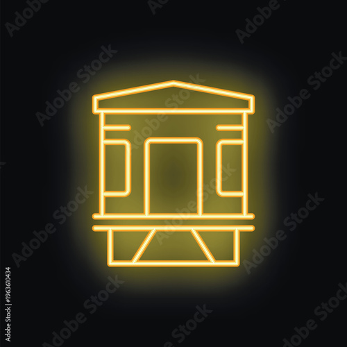 Yellow neon sign illustrating a ticket booth with a gabled roof on a black background