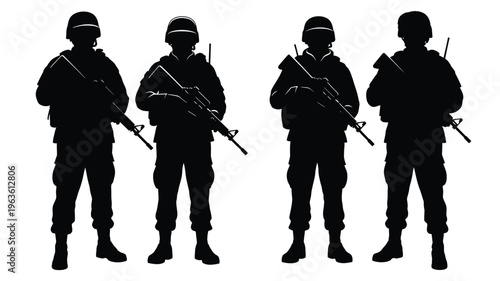 Four soldiers standing with rifles a striking black silhouette