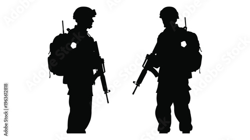 Two soldiers standing with rifles a striking black silhouette