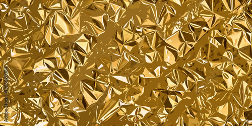 Close up of crumpled gold foil creating a textured abstract background