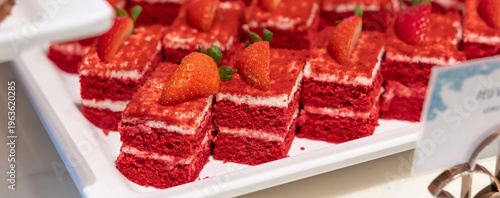 Bilde på lerret Many pieces of white cake and decorate by pink chocolate heart shape in buffet line
