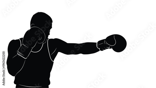 Boxer preparing to punch dynamic pose captured in black silhouette
