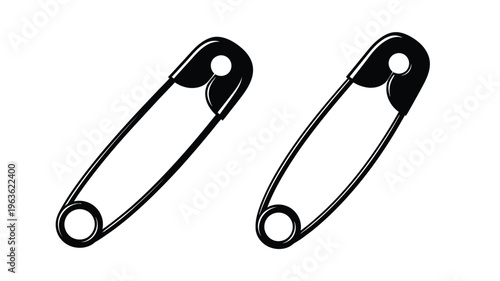 Two black safety pins displayed against a white background silhouette