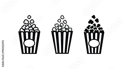 Three containers of popcorn depicted in a stark black silhouette