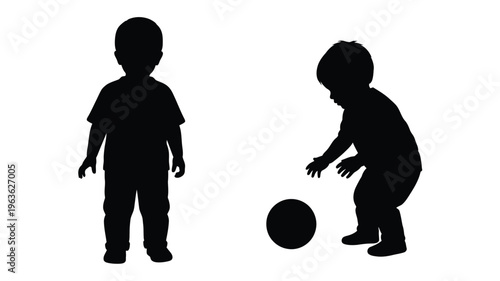 Two young children playing with a ball depicted in silhouette
