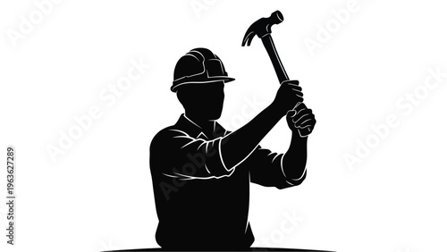 Construction worker raising a hammer depicted in stark silhouette