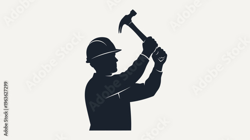Construction worker raising hammer depicted in striking silhouette