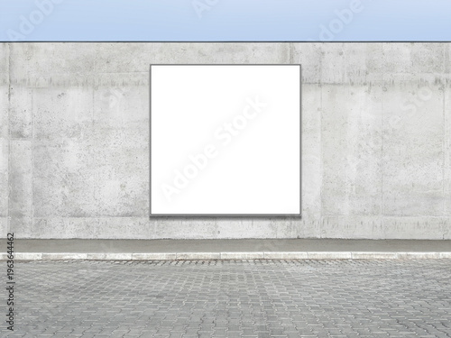 A large square white billboard is placed on the façade of the concrete fence for creative use. Advertising space. Advertising space.