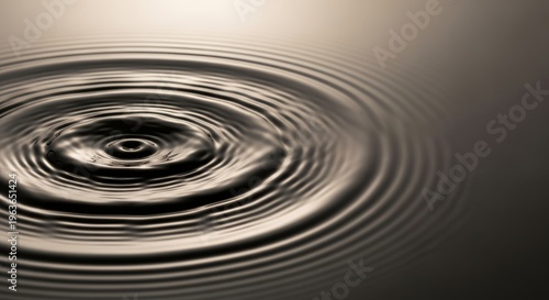 Abstract water ripple creating concentric circles on calm surface