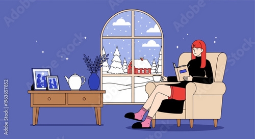 Woman sitting in a chair by a window with a laptop on her lap