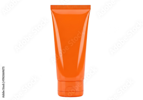 Bright orange tube of skincare or cosmetic product with smooth texture