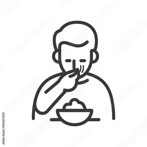A person is eating from a bowl using their fingers