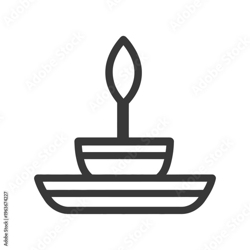 Simple illustration of a candle resting on a tiered dish
