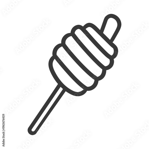 A black and white image of a honey dipper