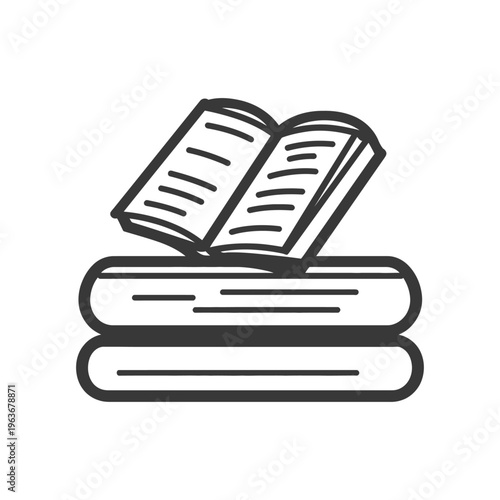 An open book rests upon a stack of bound reading materials