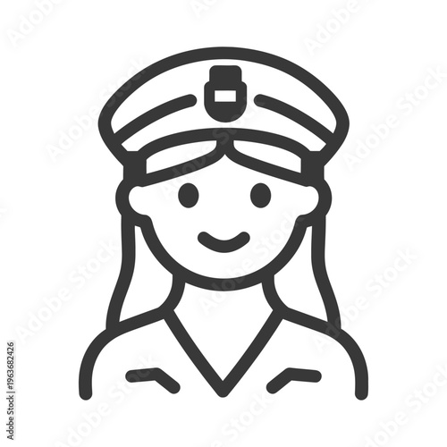 A smiling woman wearing a police hat and uniform