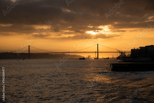 Ponte 25 de Abril sunset in Lisbon, Portugal