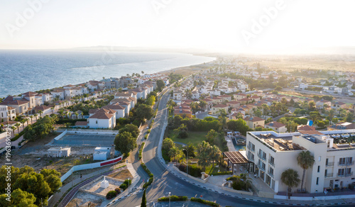 Aerial view capturing a coastal town scene in Perivolia, Larnaca District, Cyprus
