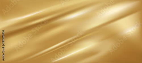 Luxurious golden silk fabric background with soft elegant waves and smooth metallic satin texture.