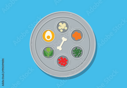 Seder plate with symbolic foods for Passover holiday celebration traditions and Jewish religious observance rituals on table.