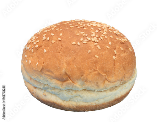 Fresh, golden-brown burger bun topped with sesame seeds. Soft, fluffy texture visible on sides. Perfect for food blogs or menu designs