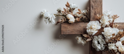Christian cross with floral decoration and copy space