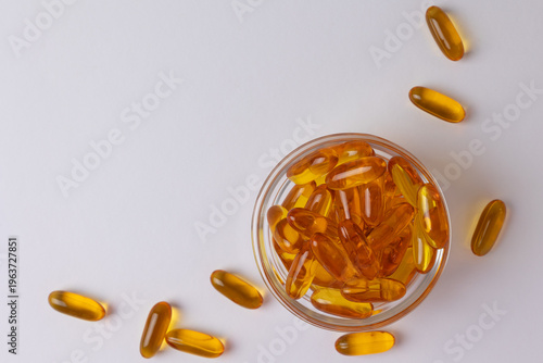 Vászonkép Studio Shot Of Golden Omega Three Softgels Emphasizing Reflectivity And Purity I