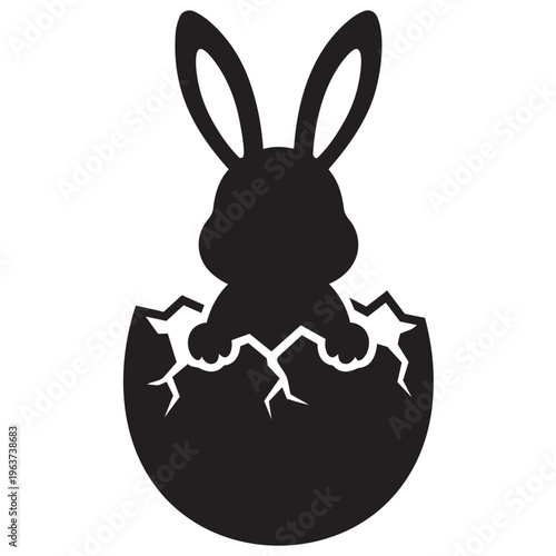 Black vector illustration of a bunny emerging from a cracked eggshell