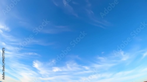 Wallpaper Mural A vast, pristine blue sky, static wide-angle video with a vertical gradient from light blue to soft white and delicate cirrus clouds, bright daylight. Concept of infinite potential and serenity Torontodigital.ca