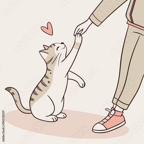 A cat extends its paw to connect with a person's hand during a quiet time together. The soft fur and gentle gesture show trust.